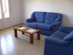 Sal&oacute;n-Estar del Piso 1&ordm;B sito en Ctra. Vieja de la Puebla n&ordm;34 de Zafra - PROHERGON