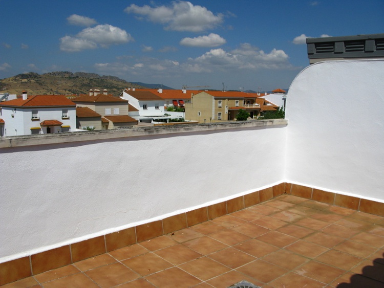 Terraza del piso 1&ordm;B sito en Ctra. Vieja de la Puebla n&ordm;34 - PROHERGON